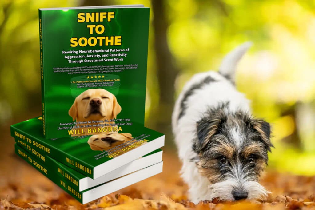 Small terrier sniffing autumn leaves in a forest setting, demonstrating natural scent-work behavior beside a stack of books titled “Sniff to Soothe” by canine behaviorist Will Bangura. The image highlights how scent-based enrichment helps calm dogs with anxiety, fear, or reactivity.